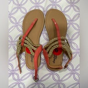 Coral sandals with gold.